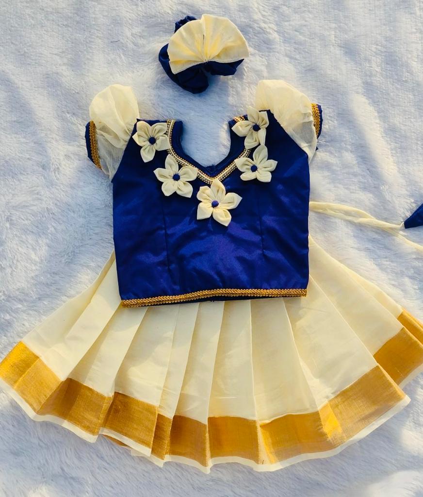 Blue top and kerala white bottom pattu pavada