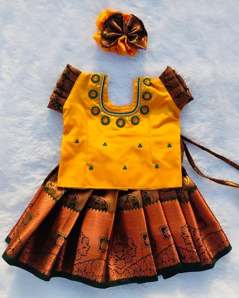 Yellow Top and Dark Green Bottom Pattu pavada