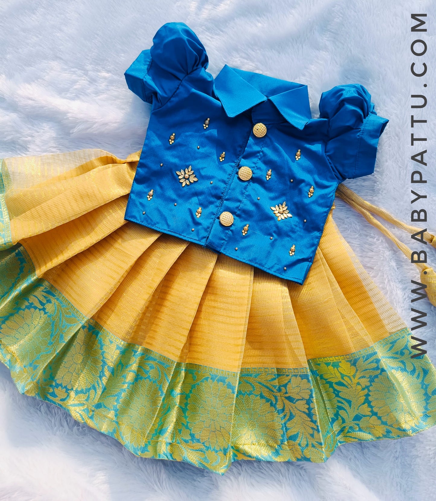 Blue Top And Gold Tissue Bottom Pattu Pavada