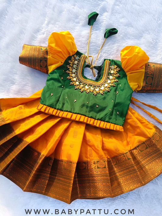 Green Top And Mango Yellow pattu Pavada