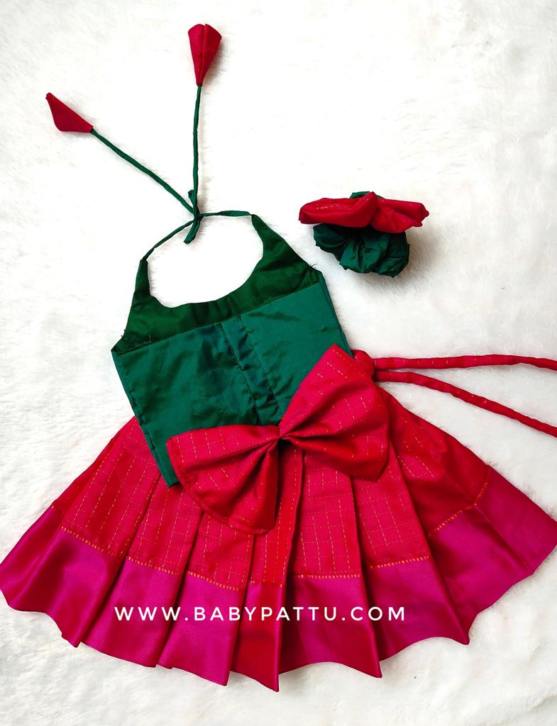 GREEN TOP AND RANI PINK BOTTOM PATTU PAVADA