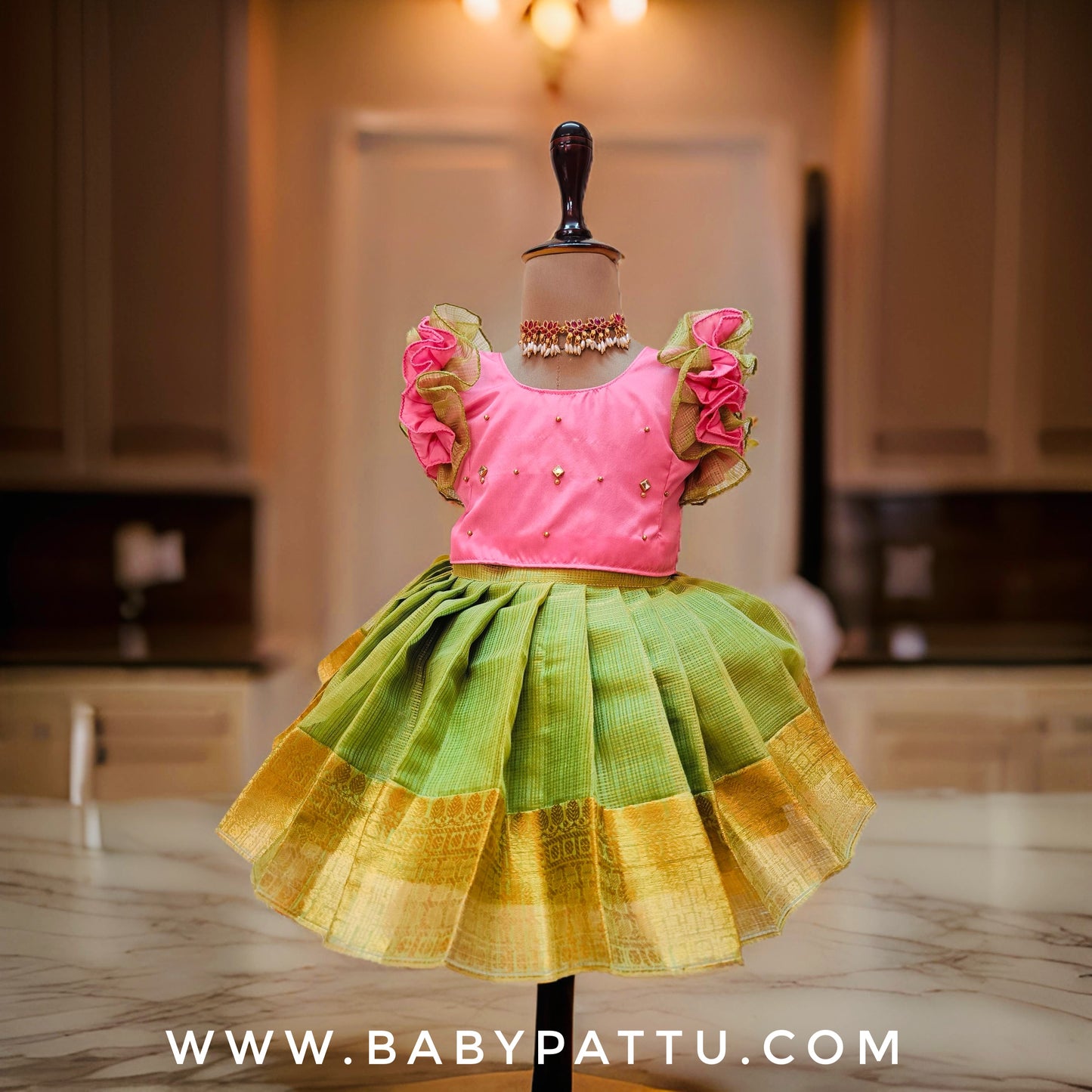 Pink and Pista Green Tissue Pattu Pavada